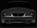Raxiom 99-04 Ford Mustang Dual LED Halo Projector Headlights- Black Housing (Smoked Lens)