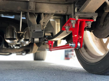 Load image into Gallery viewer, Suspension Engineering Silverado &amp; Sierra Traction Bars 1988-2023 (Standard or Flipped)(Red or Black) 33-1014