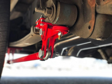 Load image into Gallery viewer, Suspension Engineering Silverado &amp; Sierra Traction Bars 1988-2023 (Standard or Flipped)(Red or Black) 33-1014